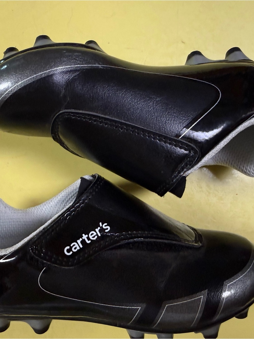 Carter's Black Soccer Cleats with Silver Accents